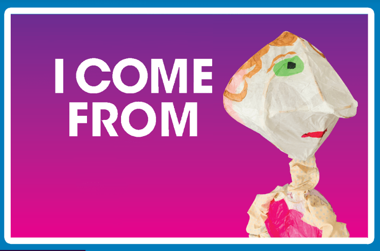 The background is dark purple at the top fading to dark pin at the bottom. Large white text reads "I COME FROM" and the image to the right is a Paper Mache puppet of a person with green eyes and orange hair